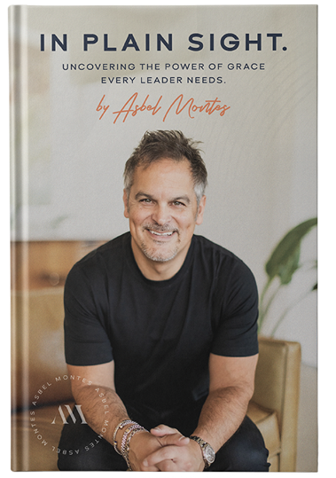 Book cover with a man sitting and text about the power of grace for leaders